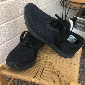 All Black New Balance Running Shoes